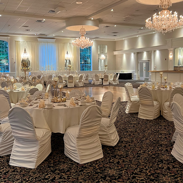 Large banquet hall with huge windows and chandeliers