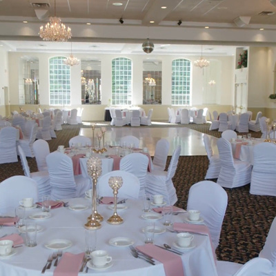 Pink and white linens in a decorated banquet hall