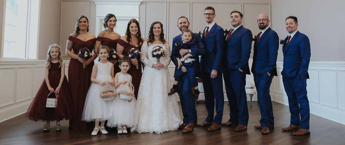 Bride and groom with their wedding party