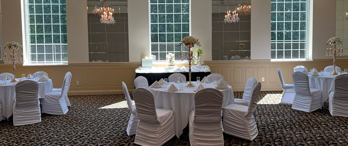 Elegantly decorated small banquet hall room 